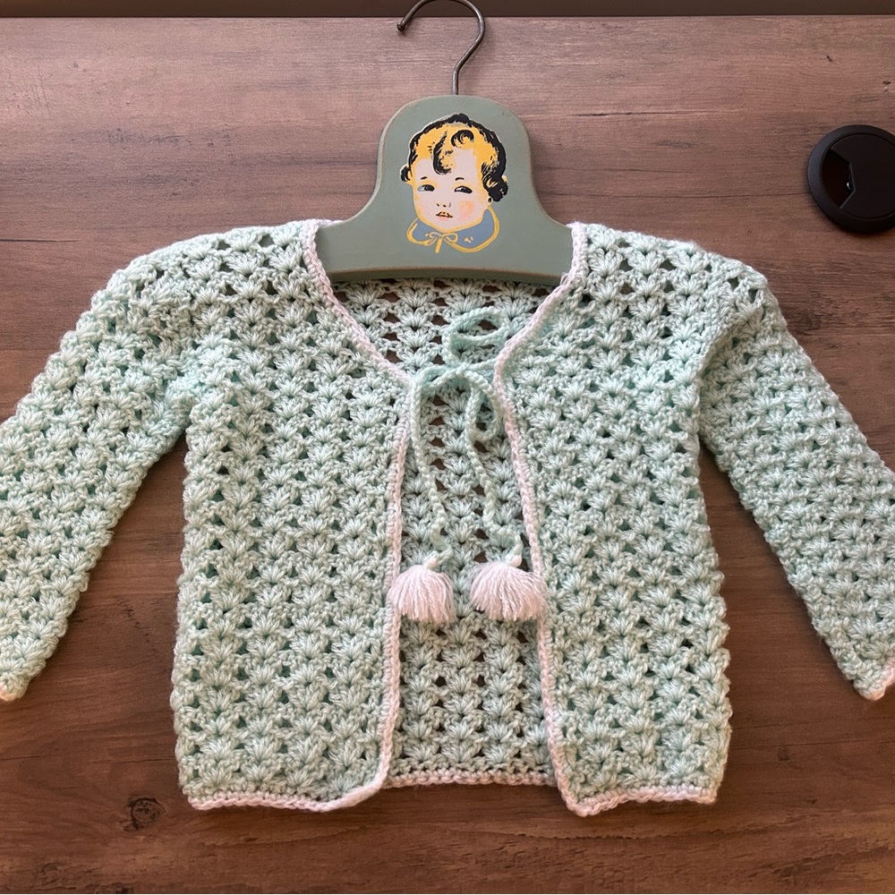 Mint Green Crochet Baby Clothing and Hanger